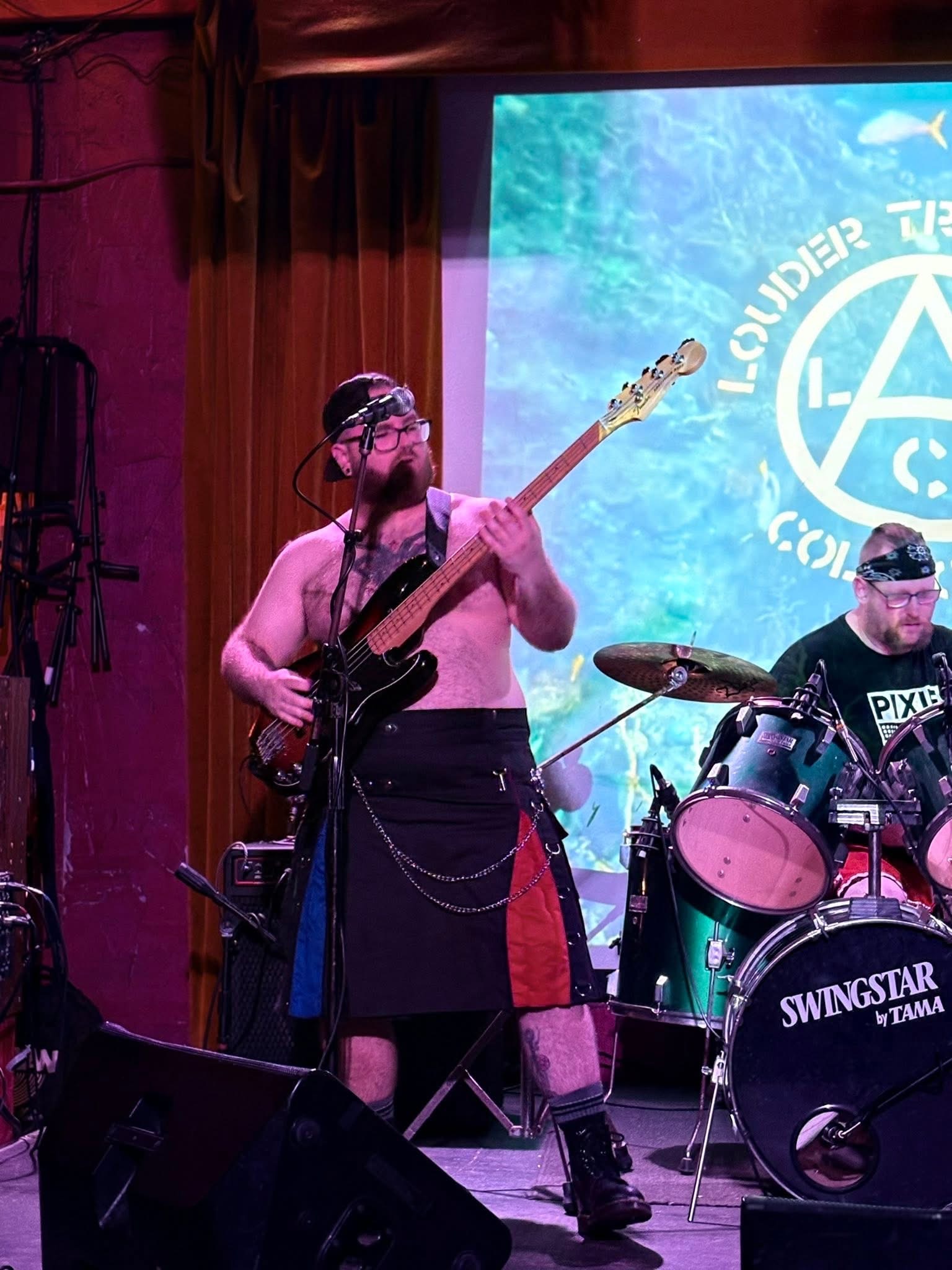topless bassist at punk show