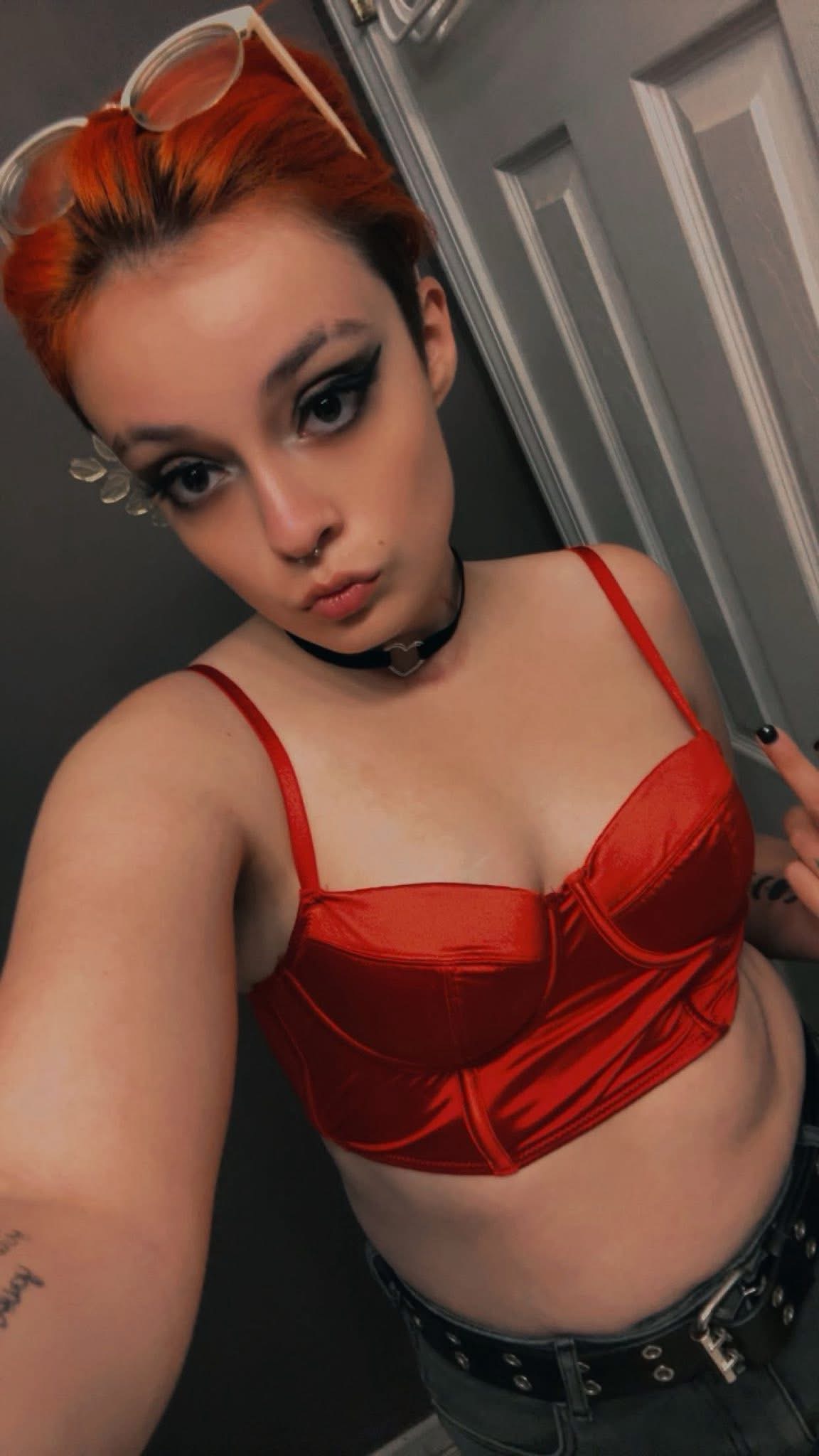 woman in red top and red hair